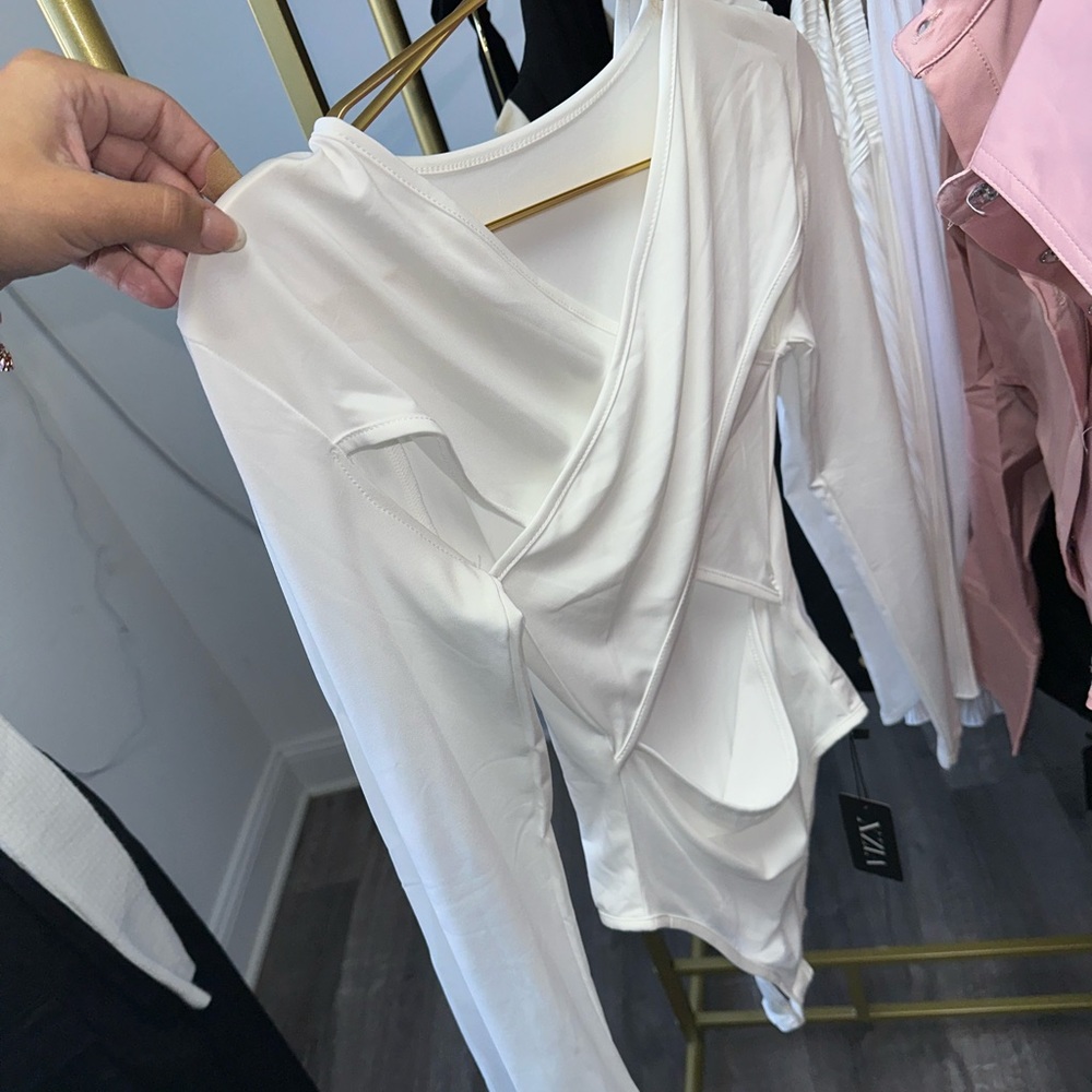 Crisscross long sleeve bodysuit